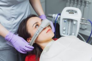 patient having a nasal mask put on